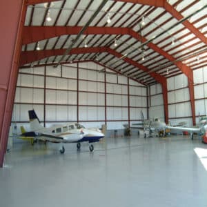 ¿Cuál es el costo de las pruebas de supresión de incendios en hangares de aeronaves?