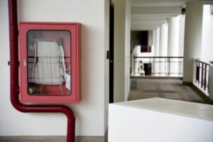 Fire hose rack and reel for standpipe