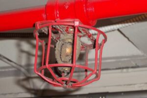 Cleaning sprinkler heads